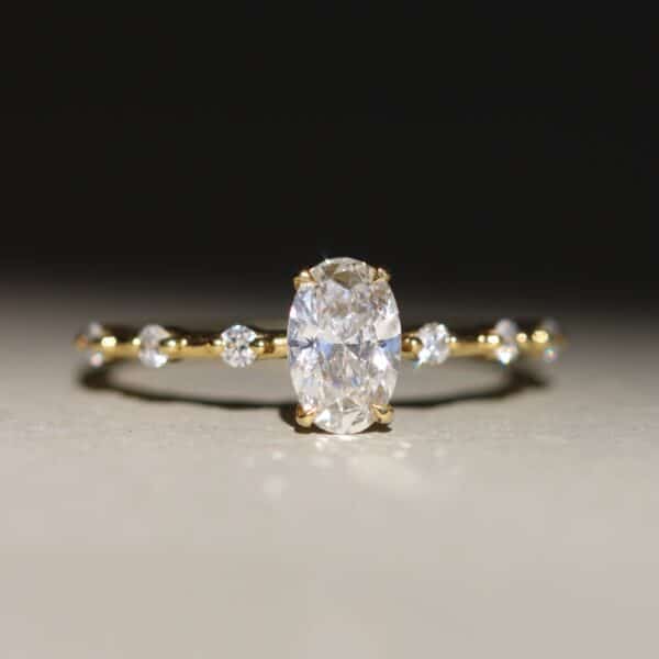 Oval celestial engagement ring