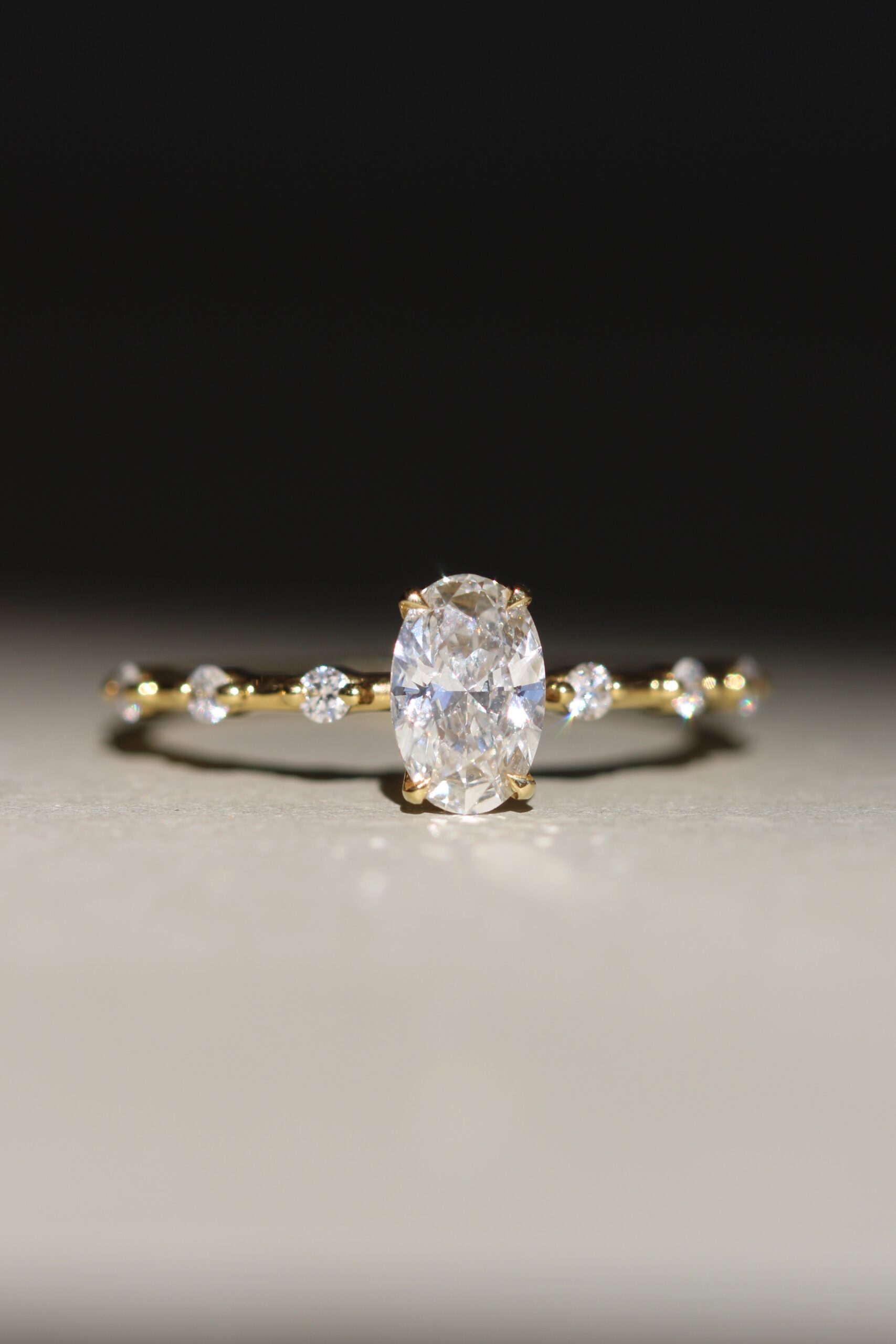 Oval celestial engagement ring